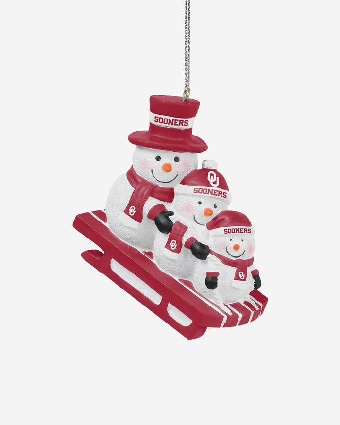 Oklahoma Sooners Sledding Snowmen Ornament FOCO - FOCO.com