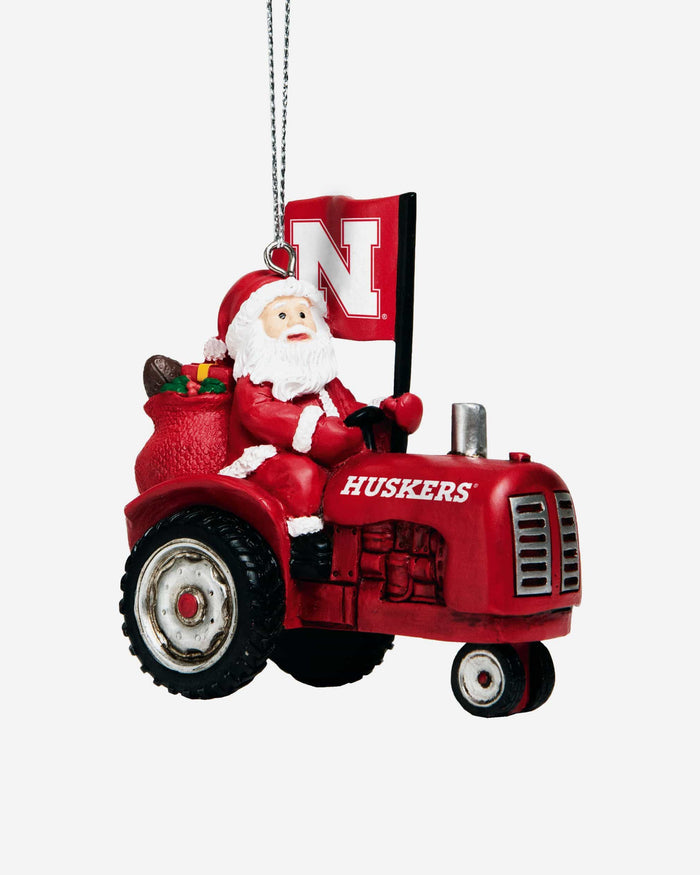 Nebraska Cornhuskers Santa Riding Tractor Ornament FOCO - FOCO.com