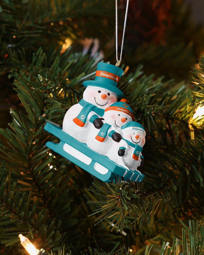Miami Dolphins Sledding Snowmen Ornament FOCO - FOCO.com