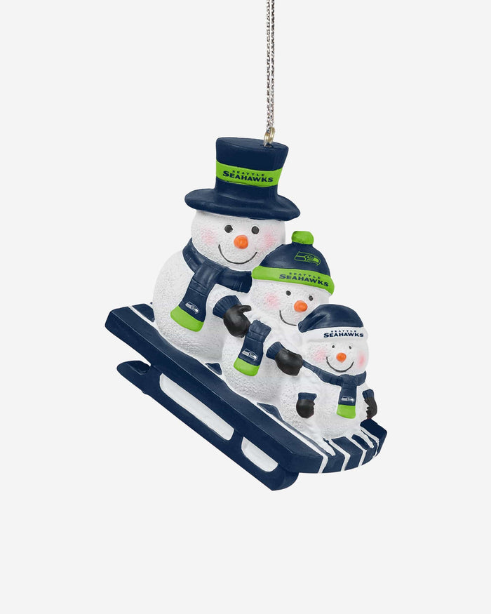 Seattle Seahawks Sledding Snowmen Ornament FOCO - FOCO.com